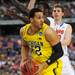 Michigan junior Jordan Morgan holds the ball around Florida defense during the second half at Cowboys Stadium on Sunday, March 31, 2013. Melanie Maxwell I AnnArbor.com